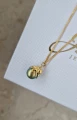 złoty naszyjnik z ośmiornicą i zieloną perłą Swarovski.jpg